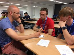 Me mentoring Jakub (left) and Pavel (right) on their LBM code